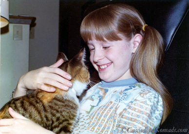 A girl and her cat: Debbie and Betsy in 1976.