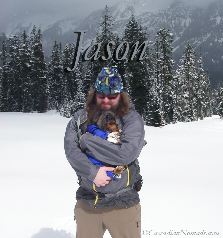 Cascadian Nomads Jason with miniature dachshund Wilhelm snowshoeing Silver Fir Snoqualmie Pass, Washington, Cascadia