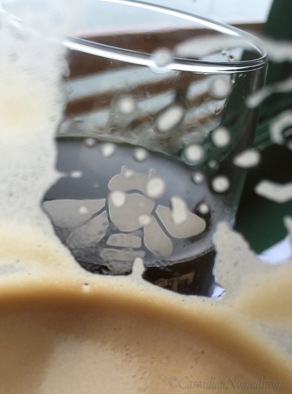 Close up photograph of the Rogue Brewing bee through a glass of nitro stout. #DogwoodWeek6 #Dogwood52
